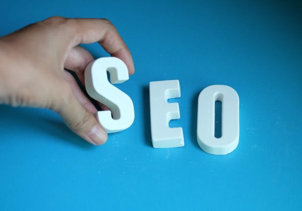 Hand arrange white letters as SEO